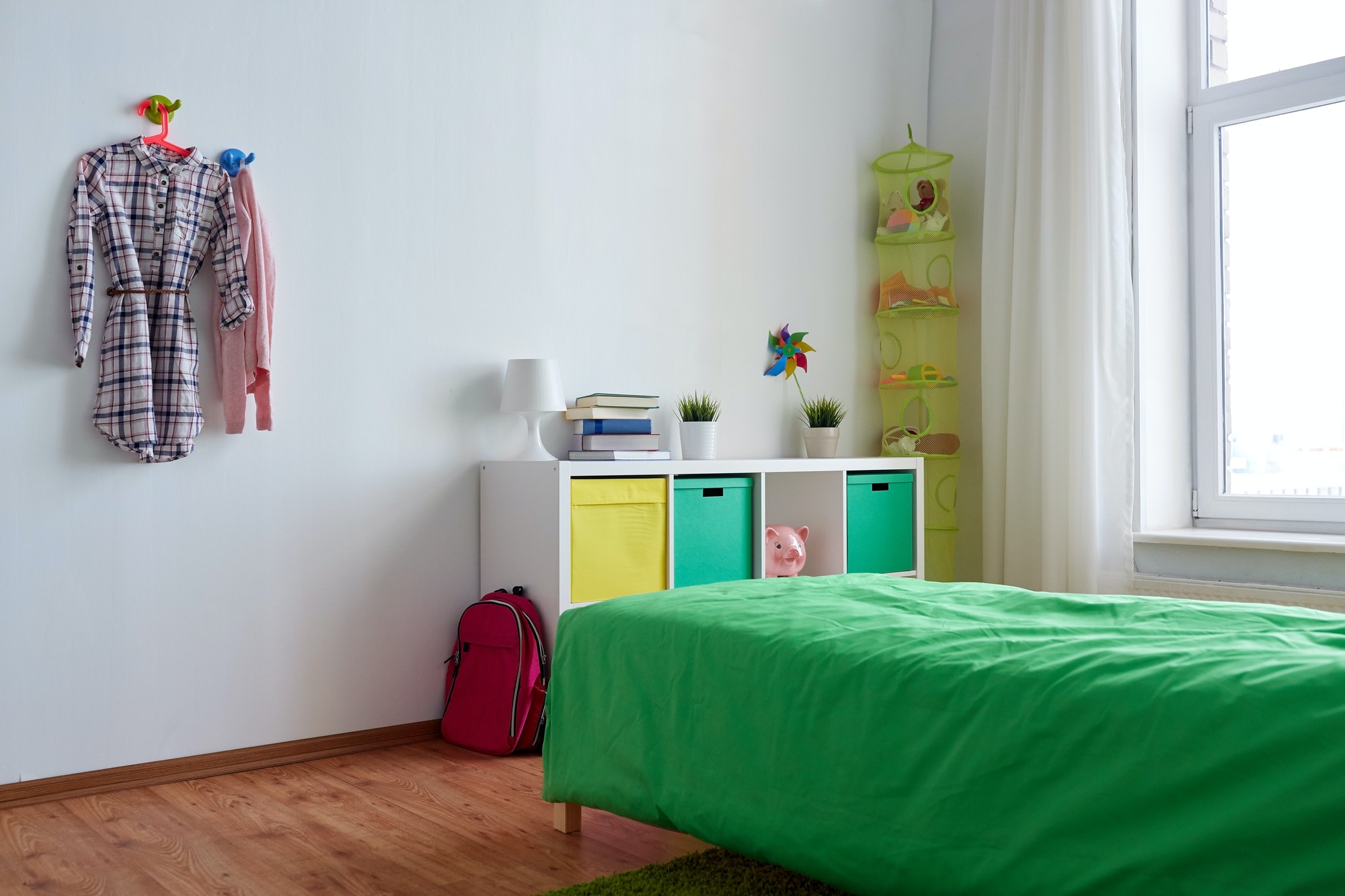 kids room interior with bed, rack and accessories